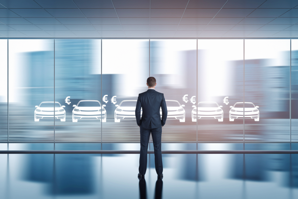homme-affaires-bureau-ecran-voitures